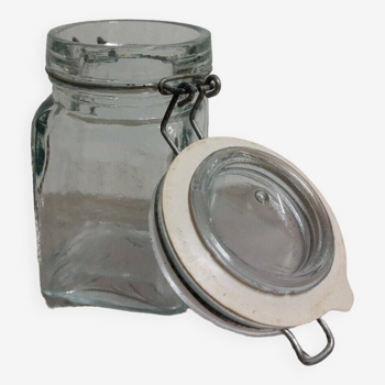 Small glass jar with vintage lid