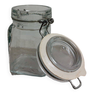 Small glass jar with vintage lid