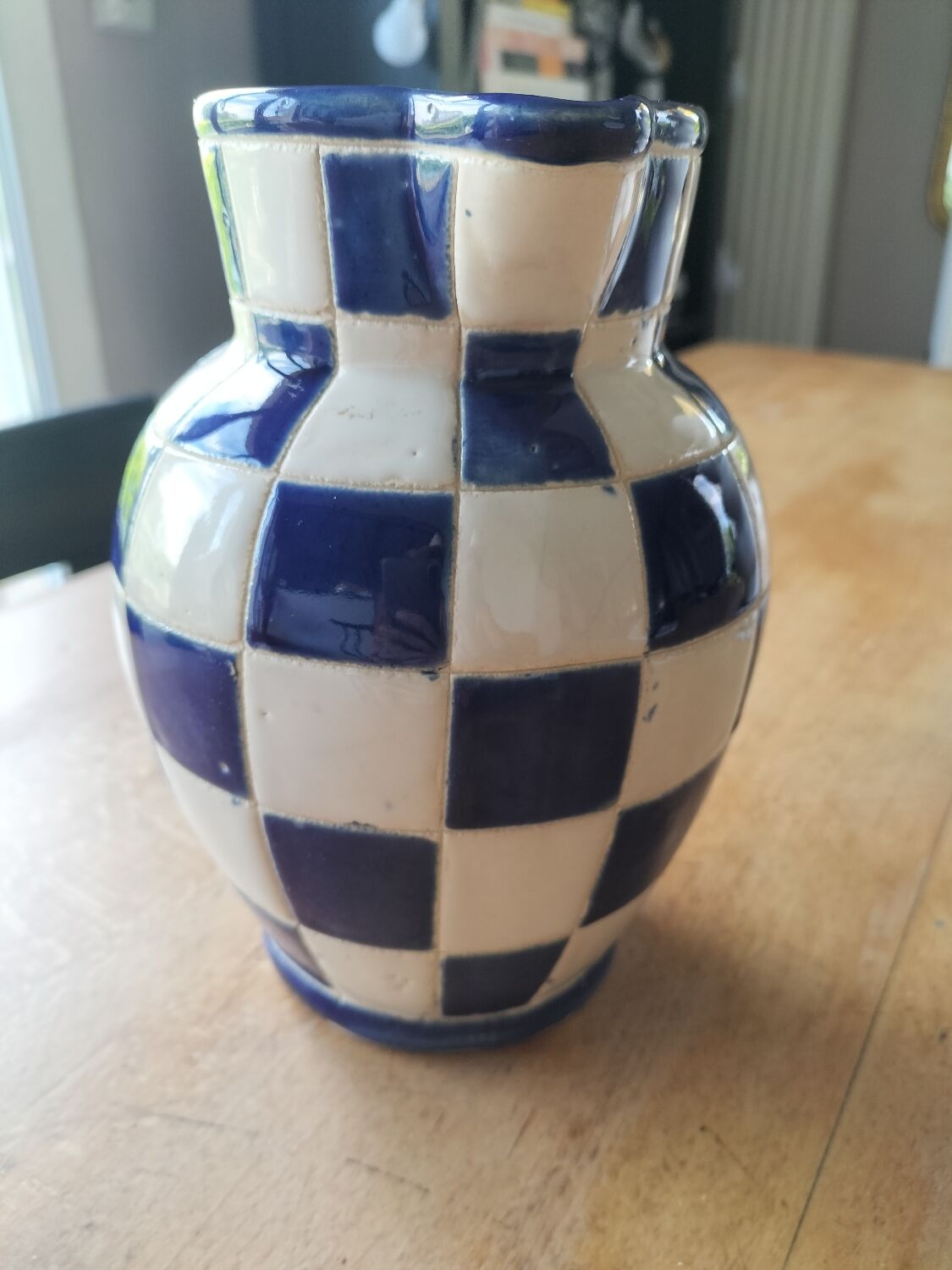 Blue and white checkerboard water pitcher
