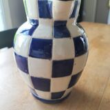 Blue and white checkerboard water pitcher