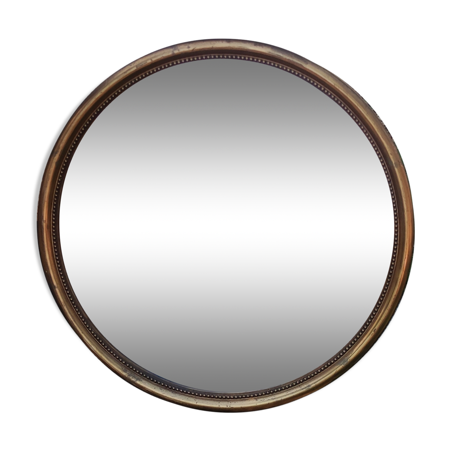 Old beveled round mirror