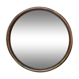 Old beveled round mirror