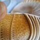Many flat plates, dish, sauce boat, vegetable dish.
