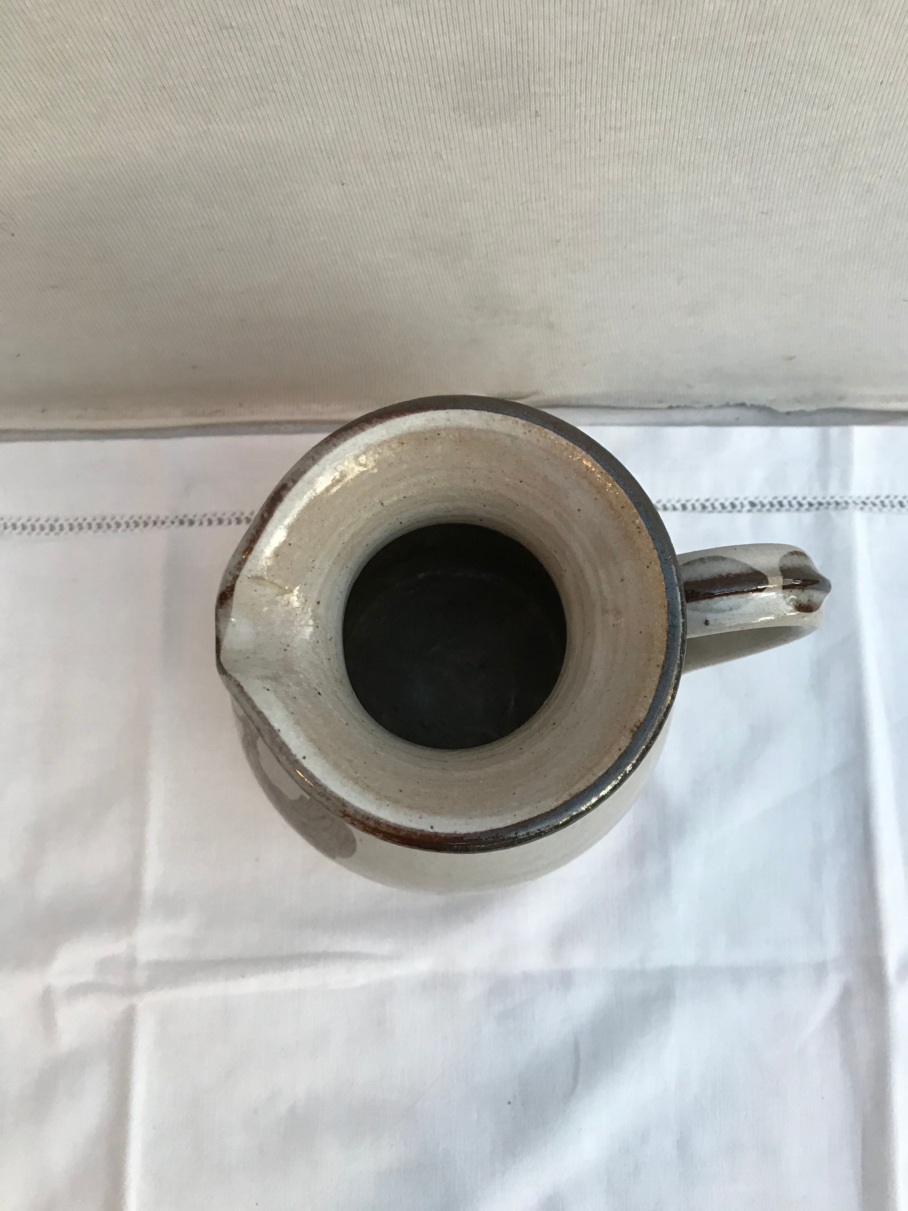 Former pitcher enamelled sandstone