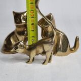 Set of three brass cats