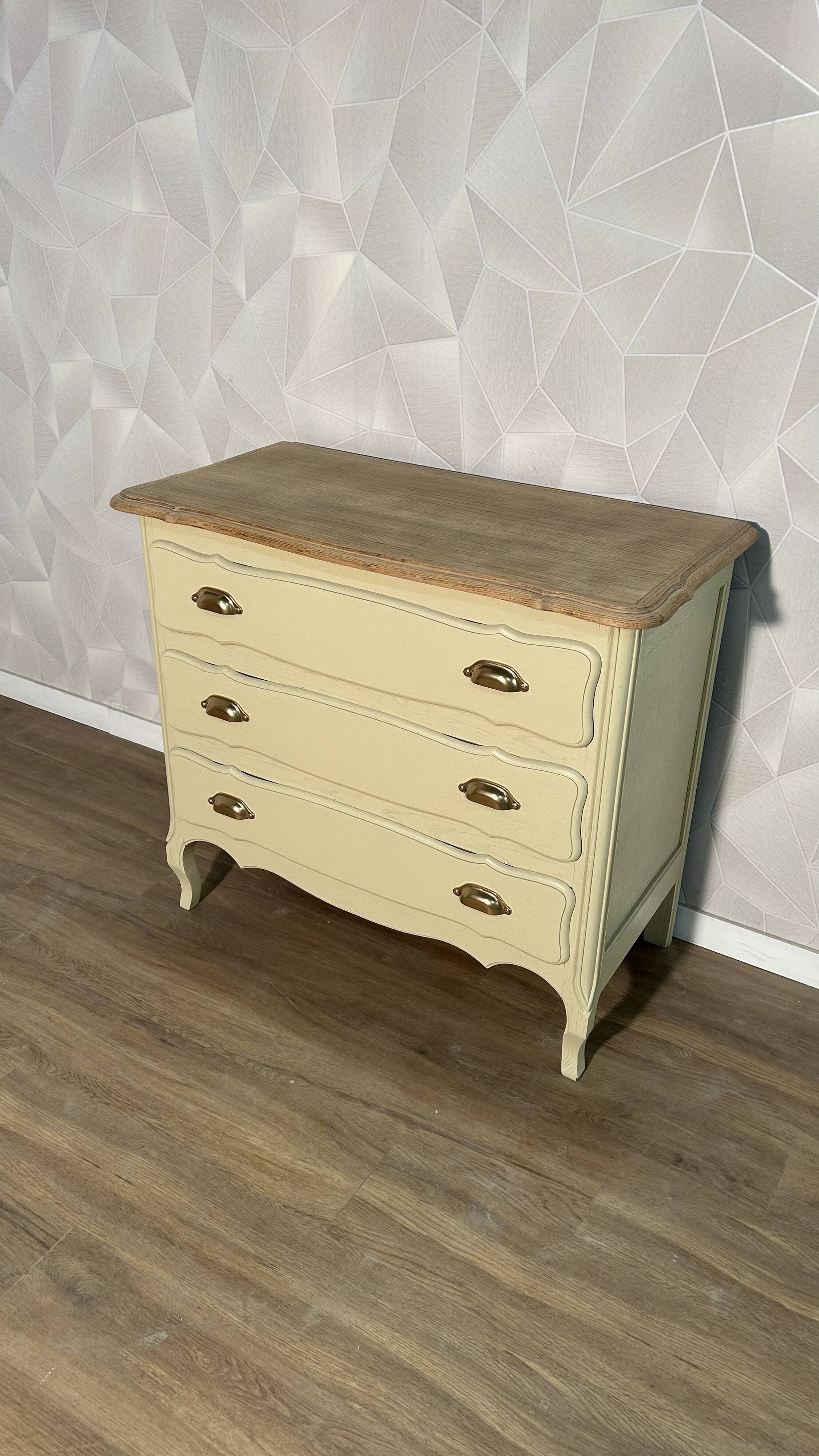 Old chest of drawers refurbished in beige cream