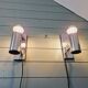 Pair of tubular chrome-plated metal wall sconces, 1970s