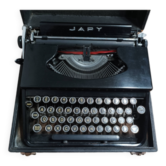 Machine à écrire Japy portable ancienne avec son coffre comme neuve