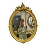 Miroir oval en bois doré 70x49cm