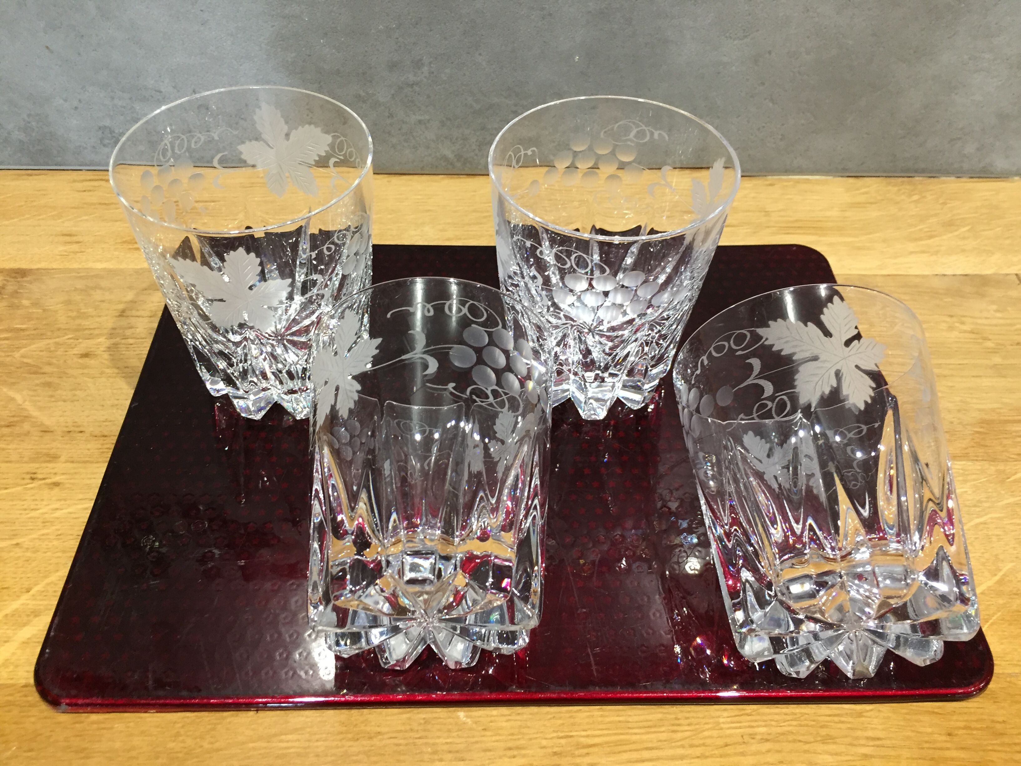 Series of 4 crystal whiskey glasses engraved vine decoration