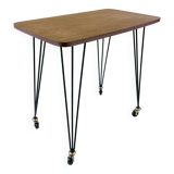 Table on wheels, laminate top and metal Eiffel legs, circa 1950