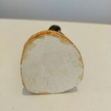 Small plaster penguin statue