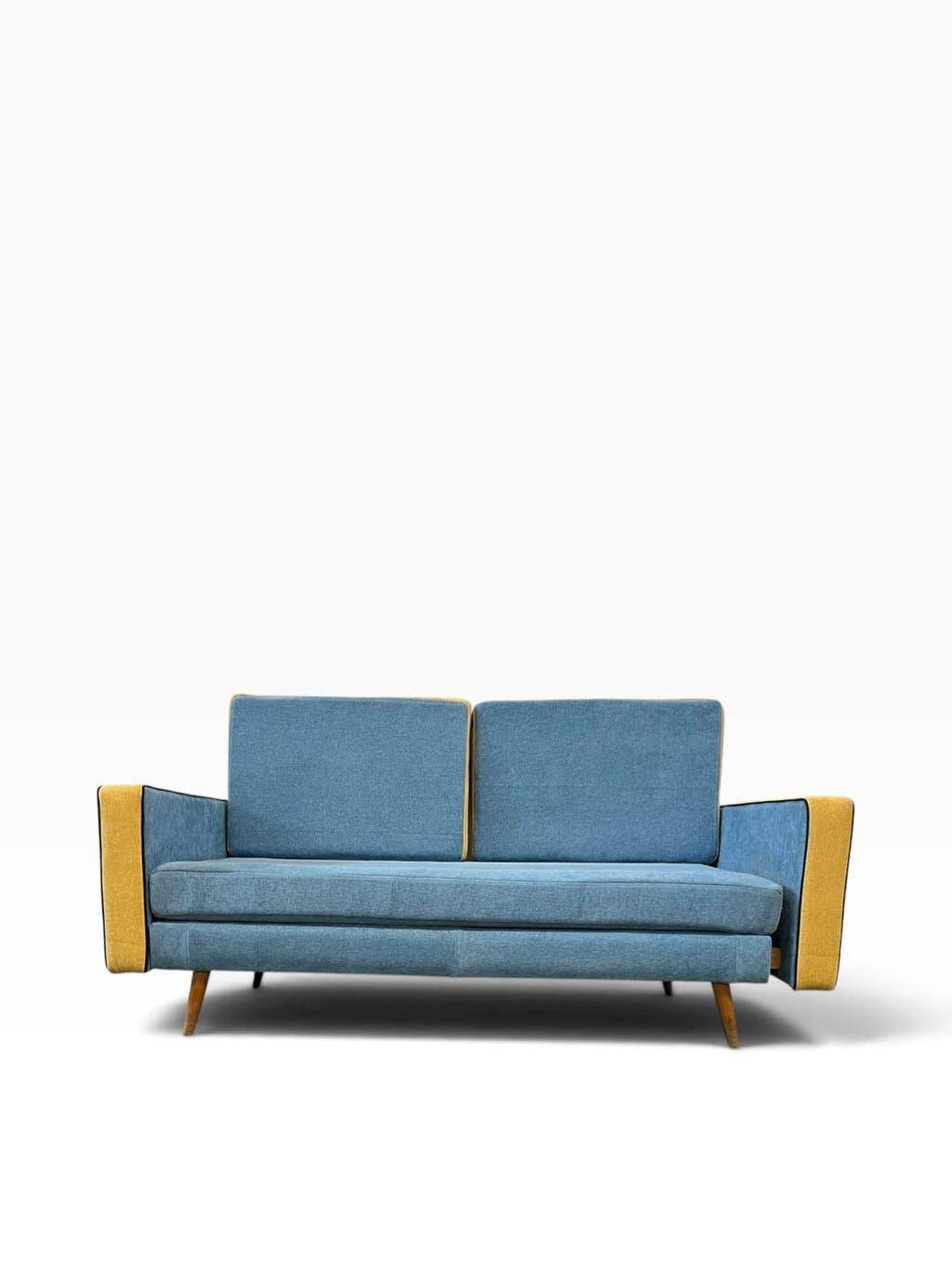 Vintage blue armchair/daybed/sofa bed with yellow accents.