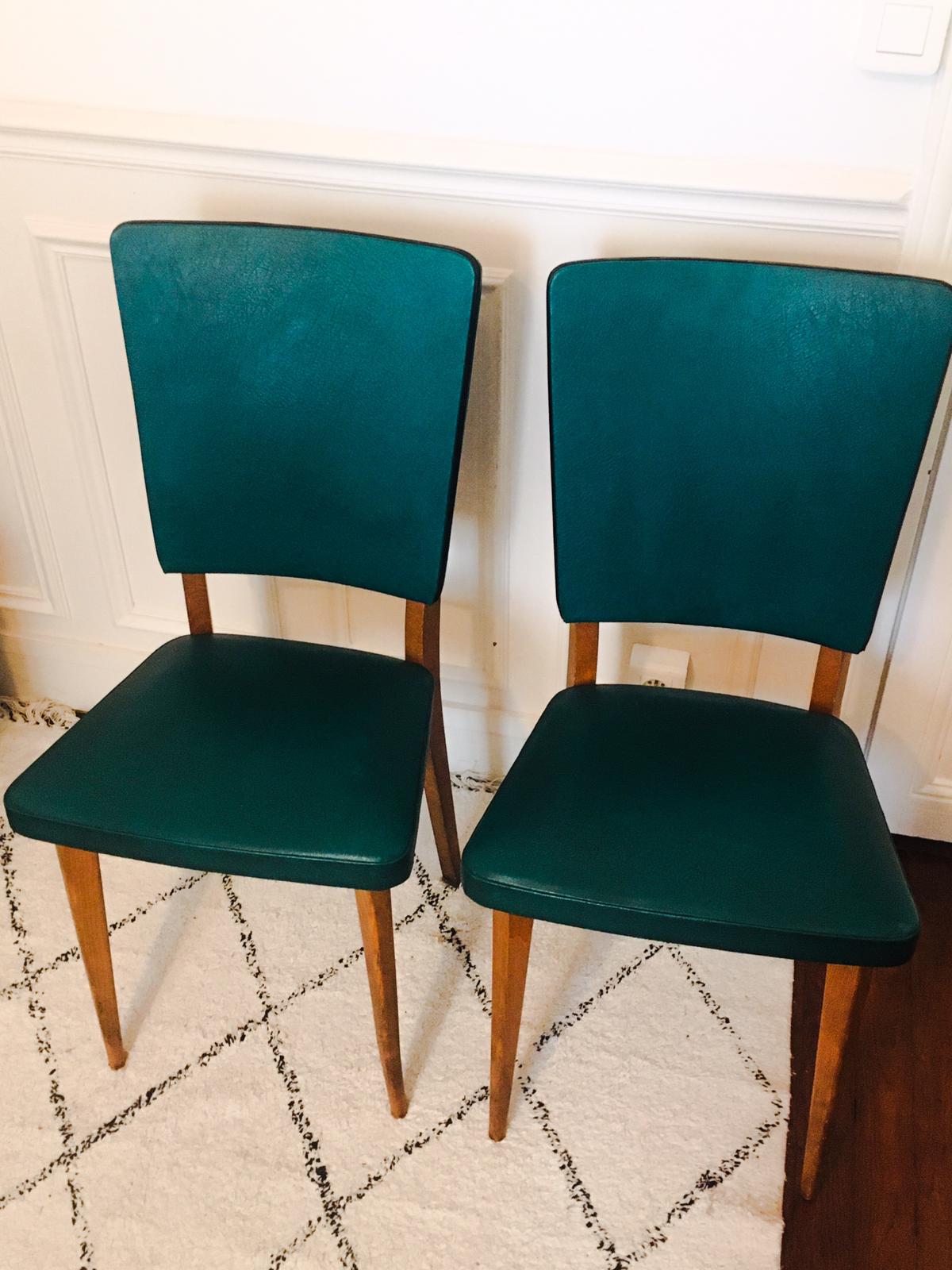 Two 1950s chairs made of wood and skai