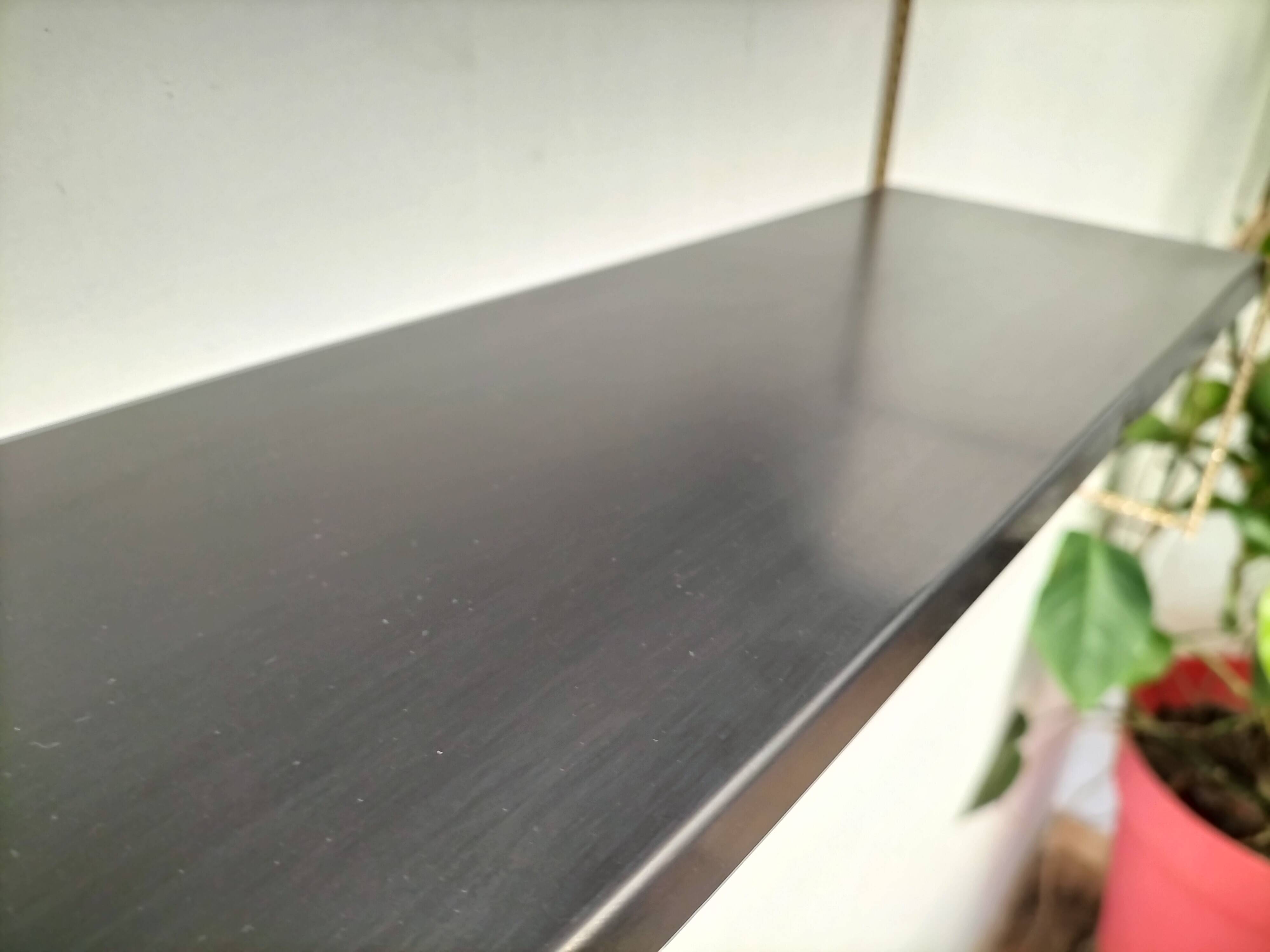 Modular black metal shelf