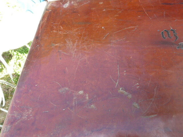 Old monogrammed leather travel suitcase and barony crown