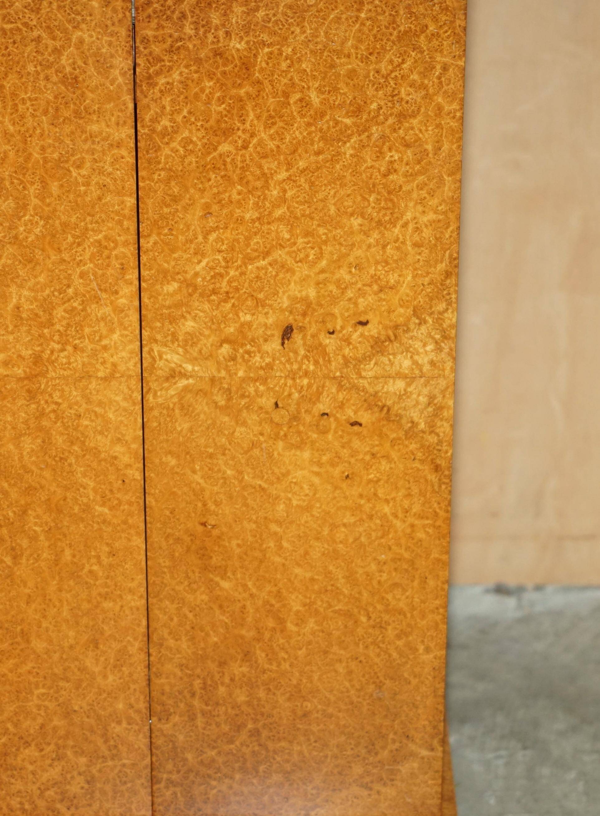 Soane Britain buffet for Bentley in Amboyna burl wood and polished metal.