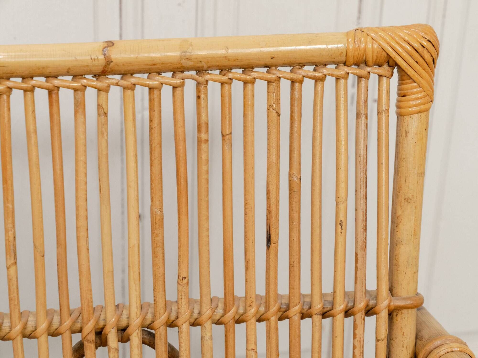 Vintage bamboo and rattan bench from the 1970s.