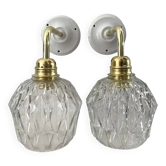 Pair of chiseled glass wall sconces
