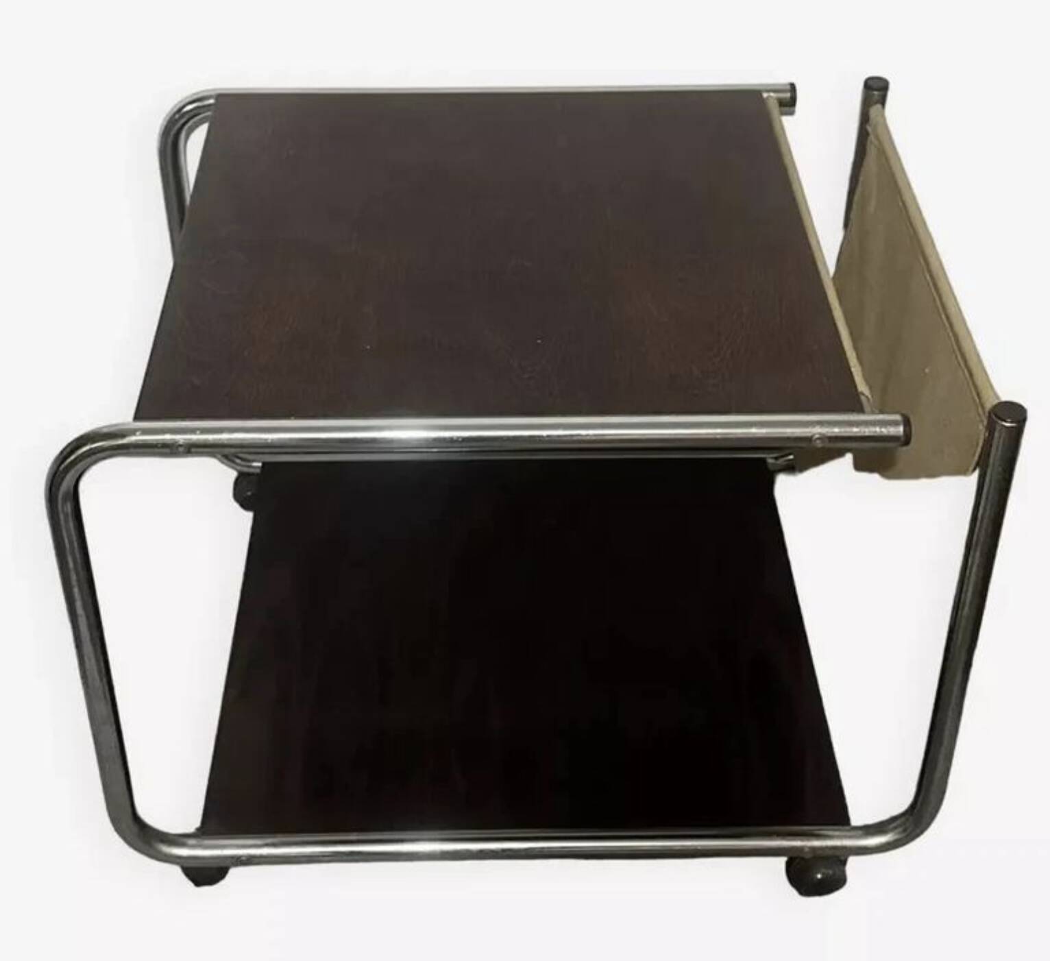1970s/80s coffee table on casters with metal tubing, light-colored door