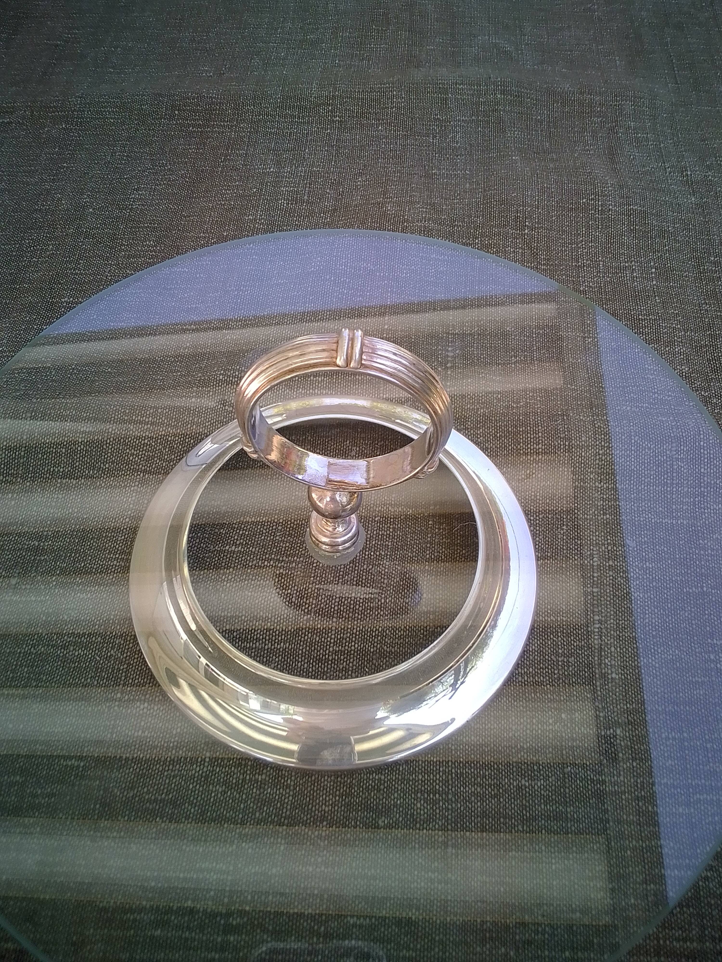 Glass and silver metal top