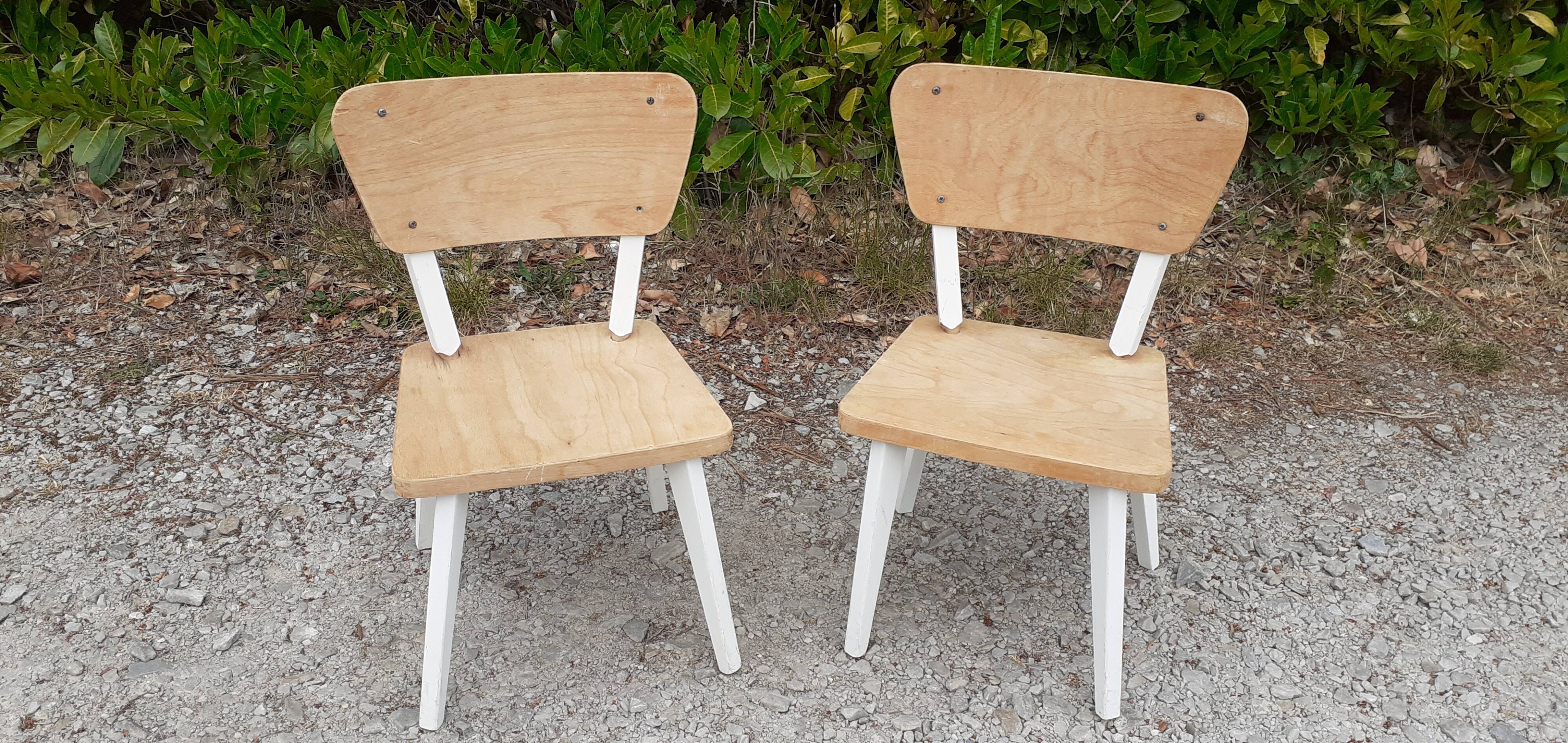 Pairs of children's chairs feet compass vintage wood