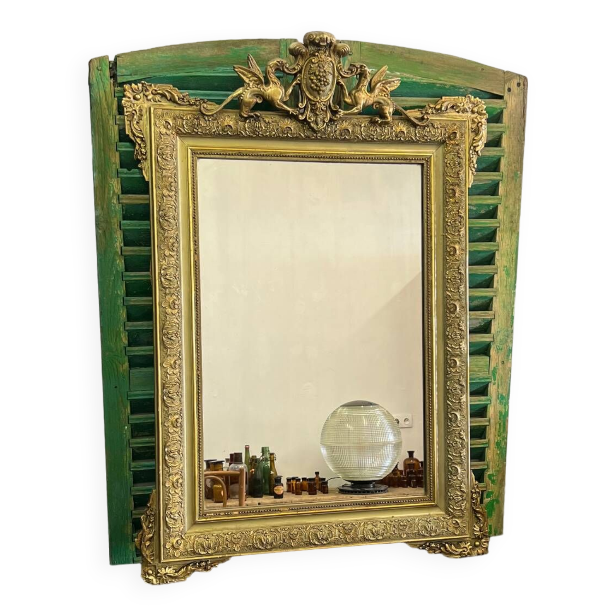 Old Napoleon III mirror decorated with a griffin