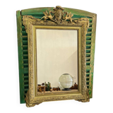 Old Napoleon III mirror decorated with a griffin