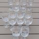 Set of 15 engraved crystal glasses with a gold rim.