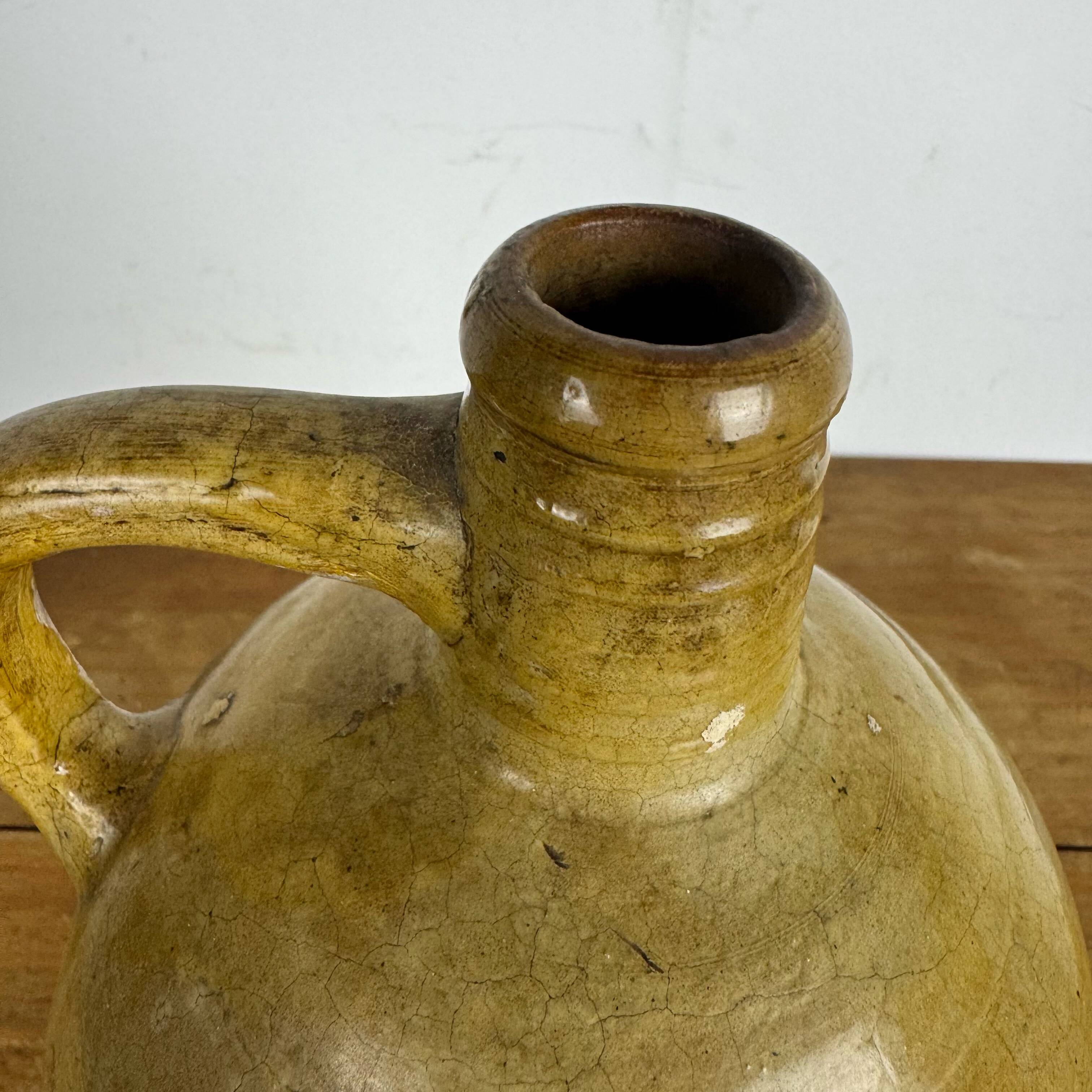 Antique glazed earthenware jug