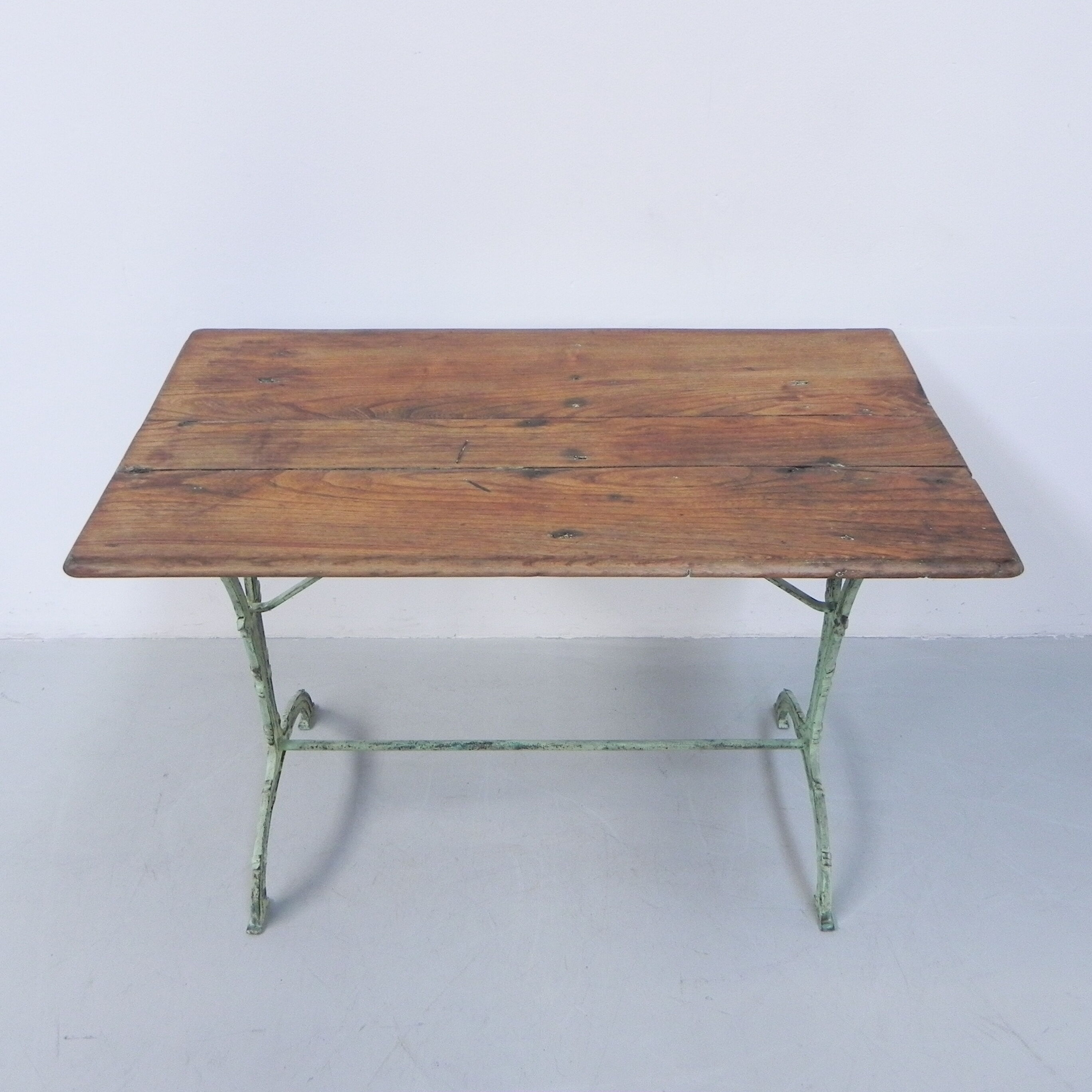 Art nouveau bistro table with cast iron frame