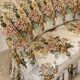 Napoleon III floral toad sofa with boudoir spirit and sliced backrest.