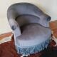 Fauteuil crapaud tissu bleu et frange