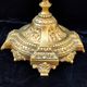 Pair of antique carved bronze candlesticks.