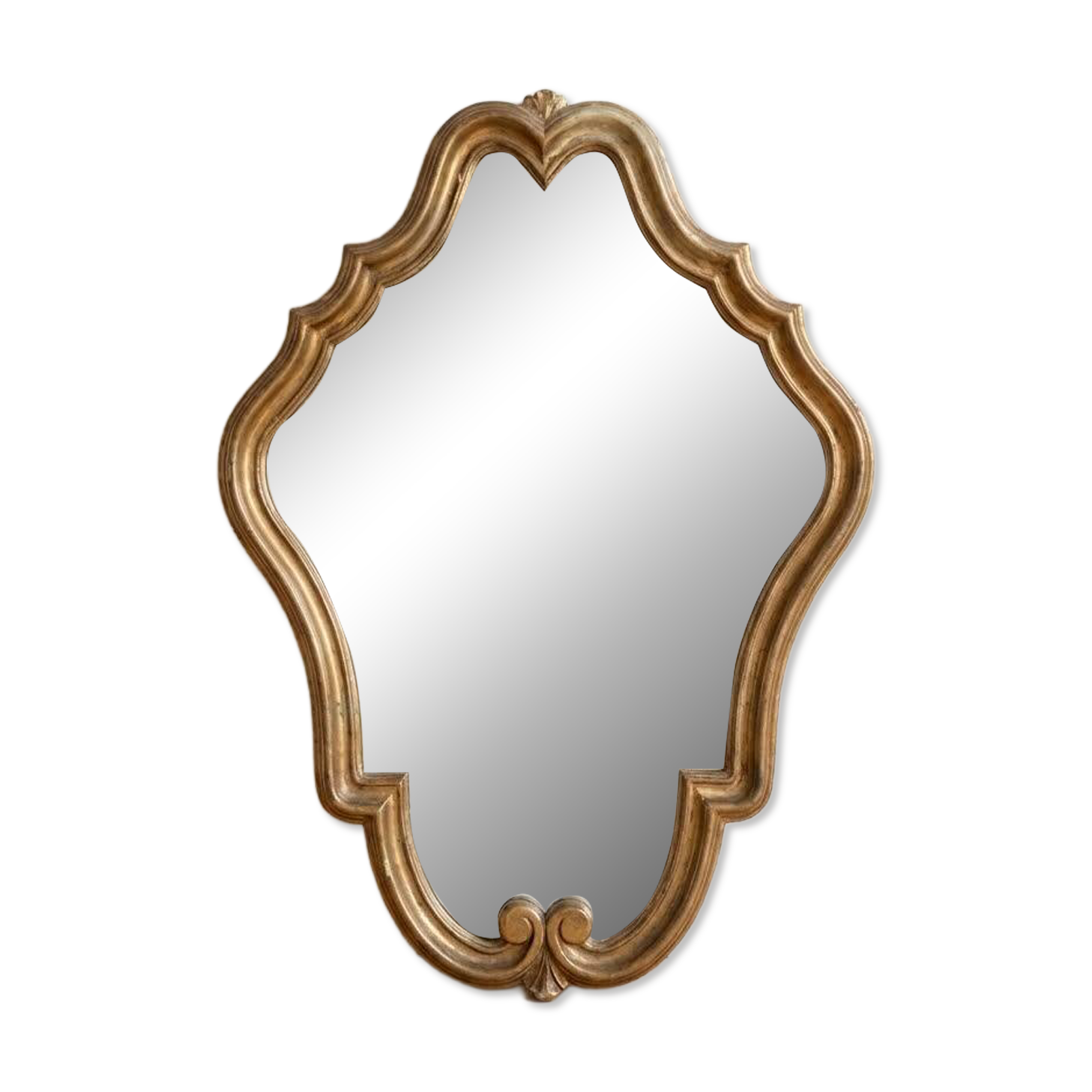 Antique mirror with a gilded wooden frame.