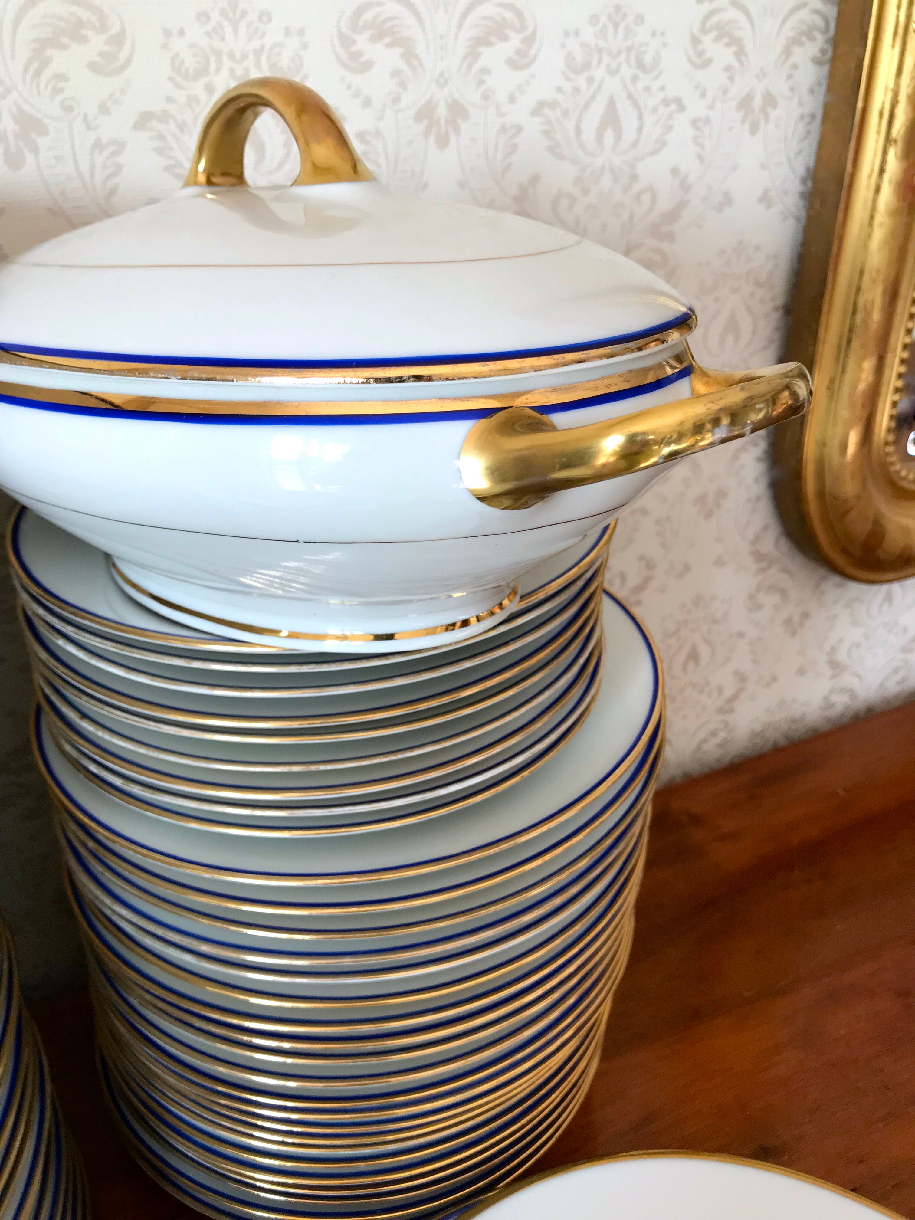 table service art deco limoges porcelain white border blue and gold 61 pieces signed