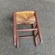 Traditional farmhouse stool in solid wood with straw seat.