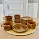 6 stoneware cups and 6 enamel plates
