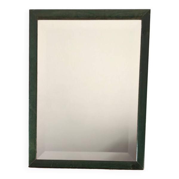 Miroir biseauté et cadre en bois vernis