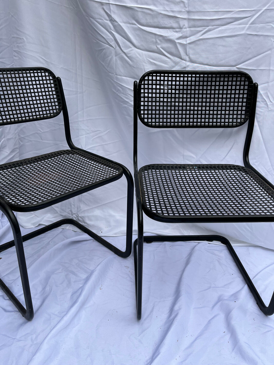 2 metal chairs