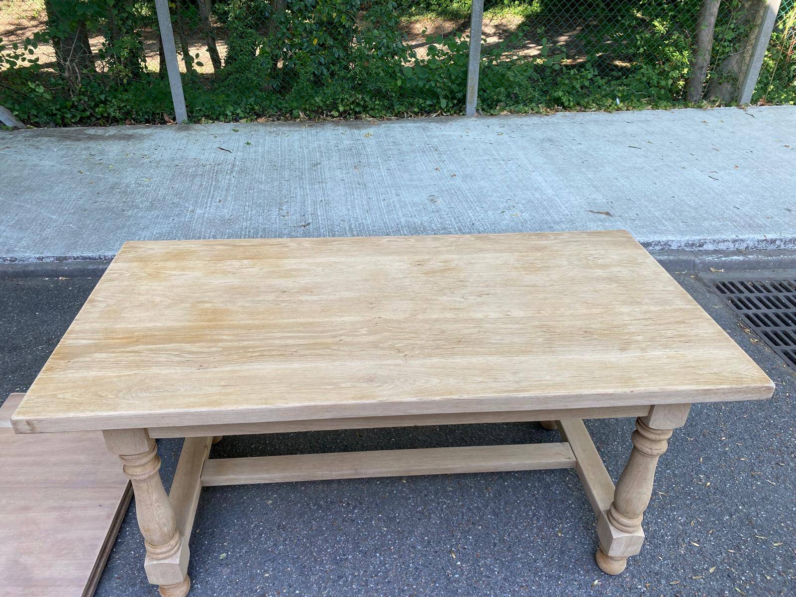 Renovated extendable farmhouse dining table made of solid raw oak from the 1950s.