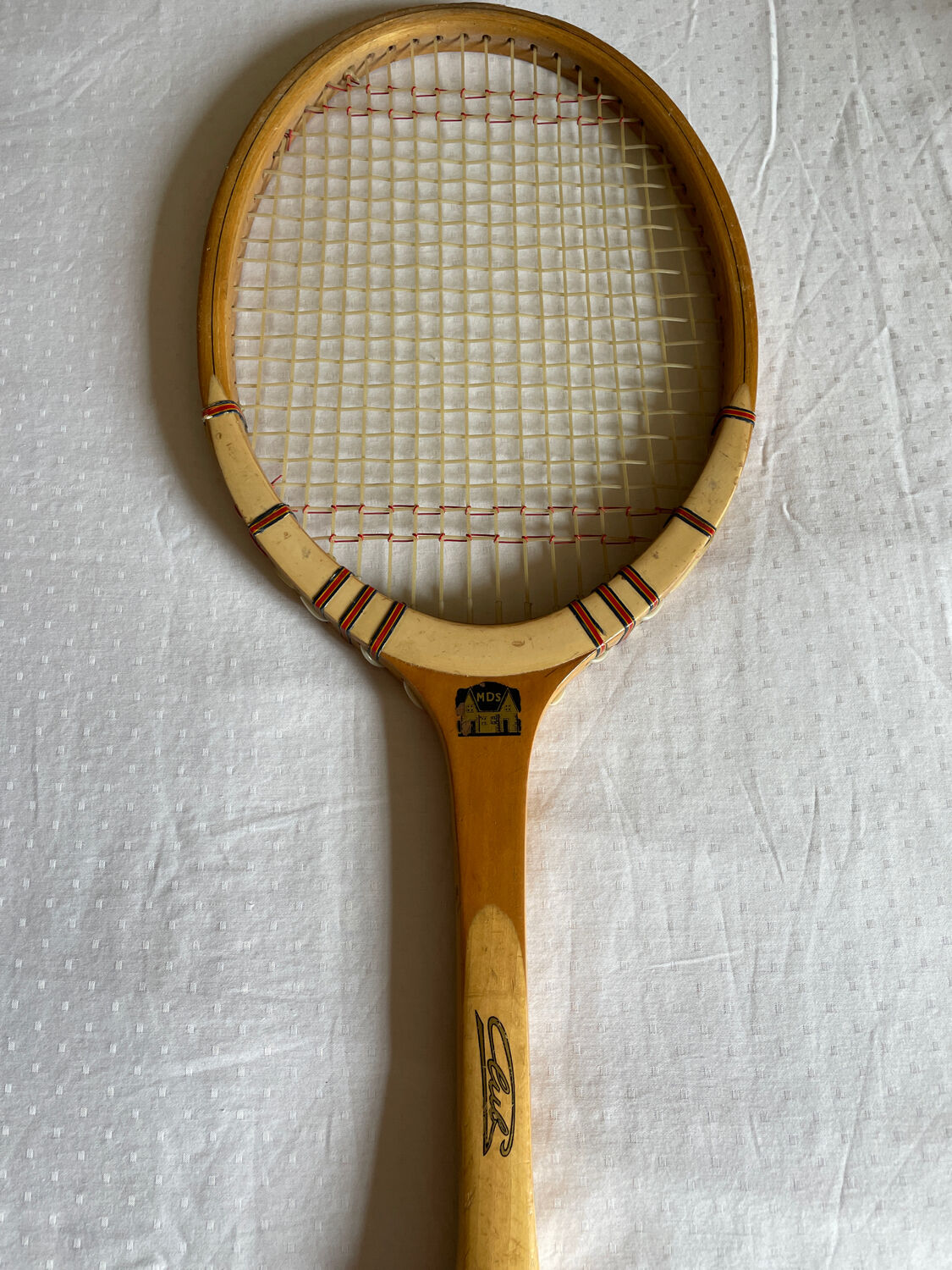 Vintage blond wood tennis racket