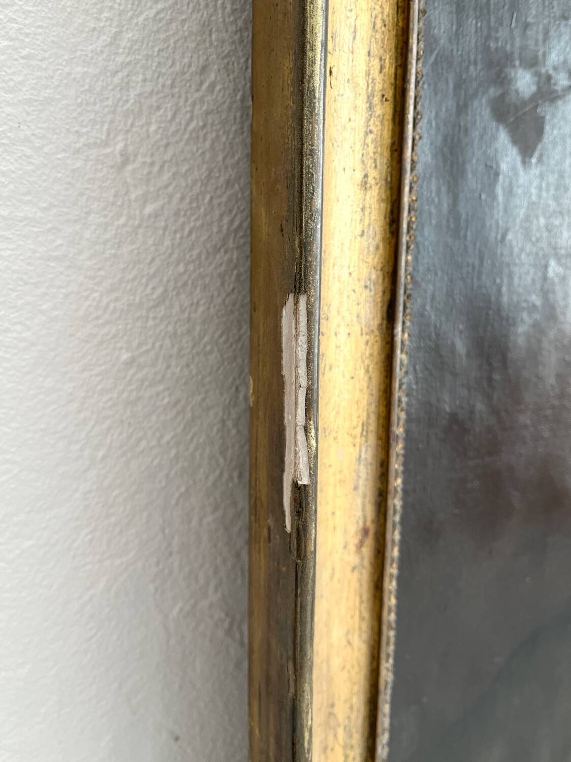 Old oil painting on canvas portrait of a woman with a red bow, late 19th century