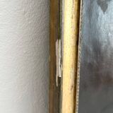 Old oil painting on canvas portrait of a woman with a red bow, late 19th century