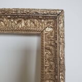 Cadre ancien en bois sculpté doré