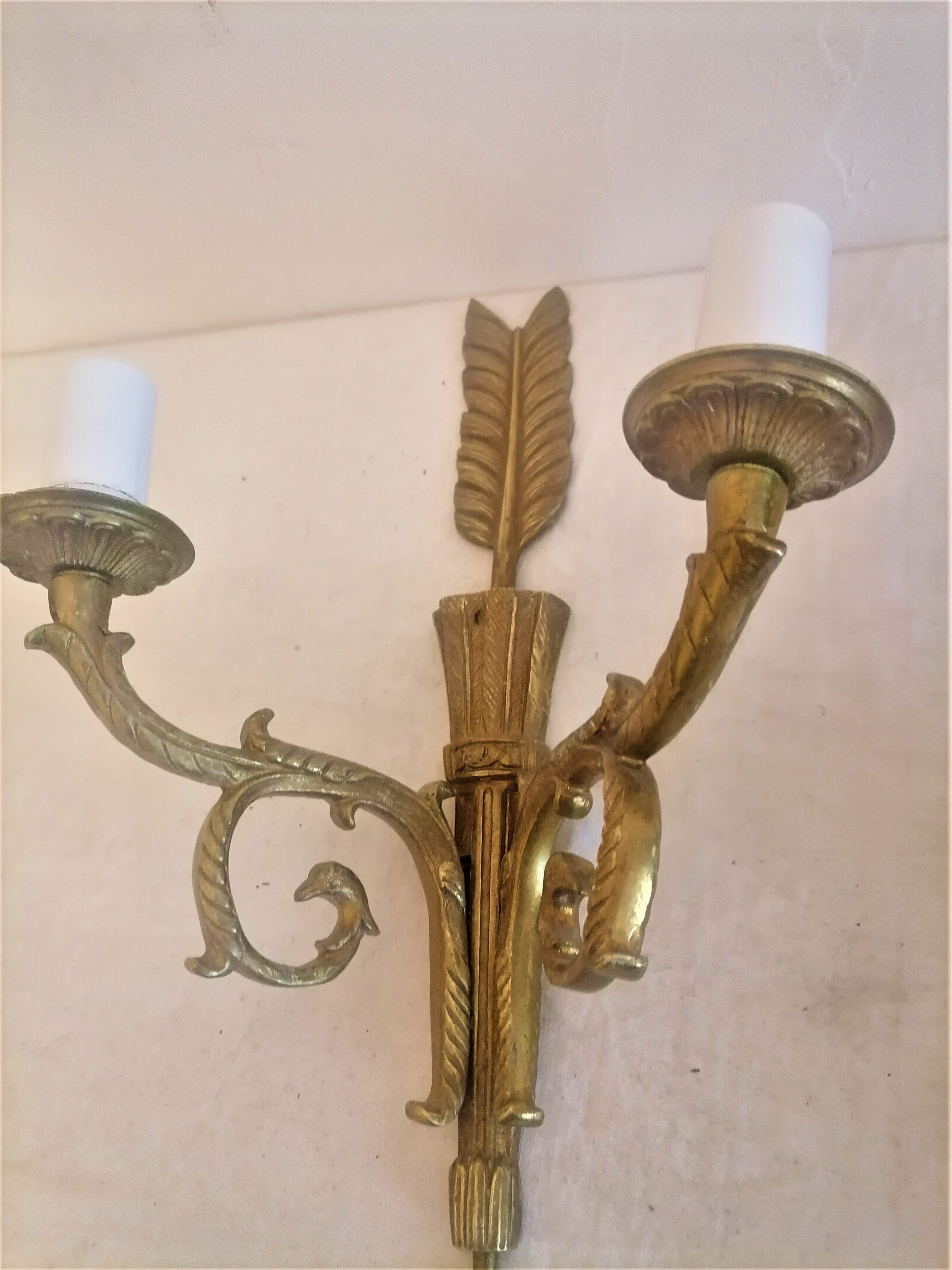 Ancienne paire d'appliques en bronze doré de style empire