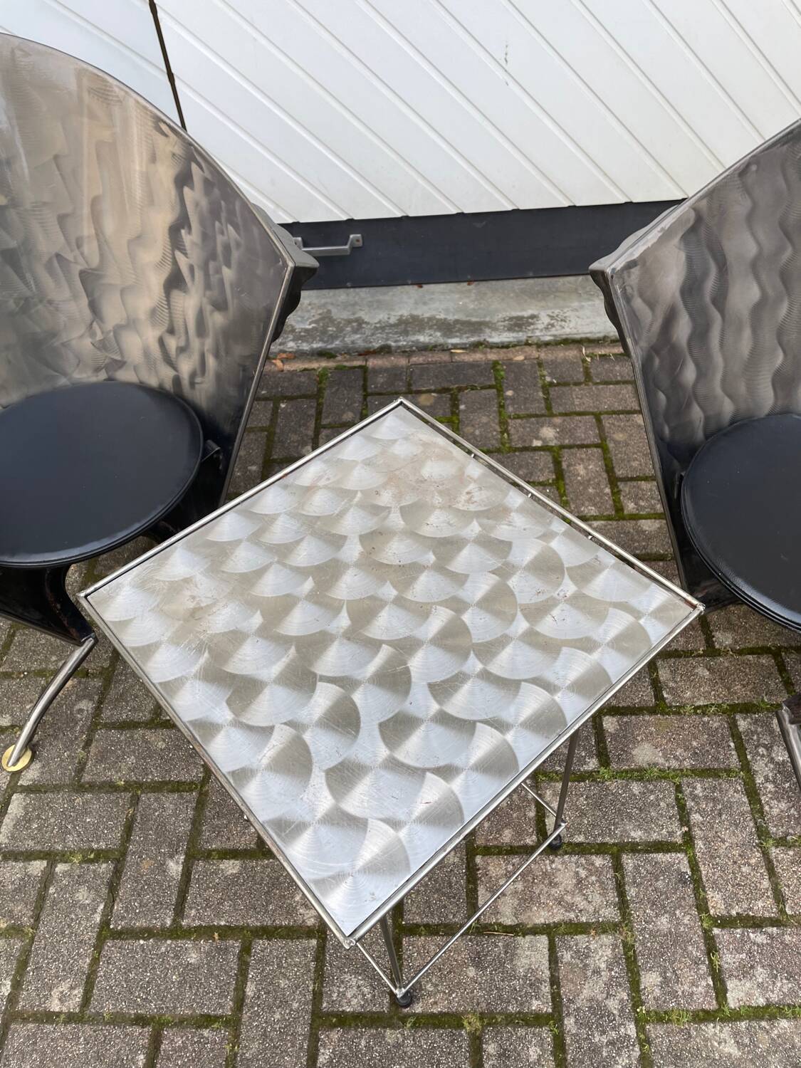 2 cone chairs and a table by Steel-Line