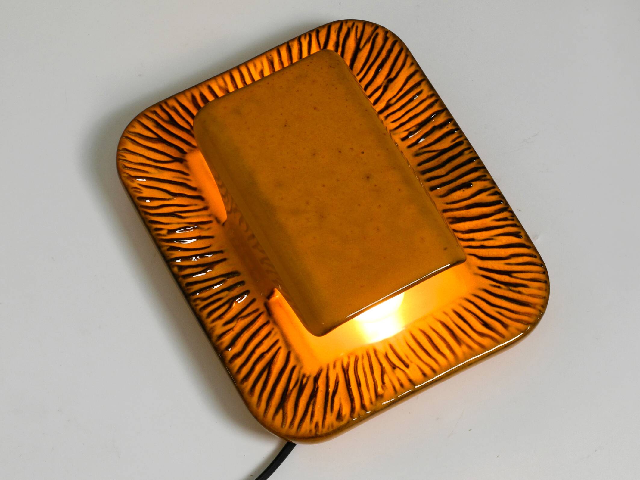 Pair of orange and green glazed 60s ceramic wall lights by Kaiser Leuchten