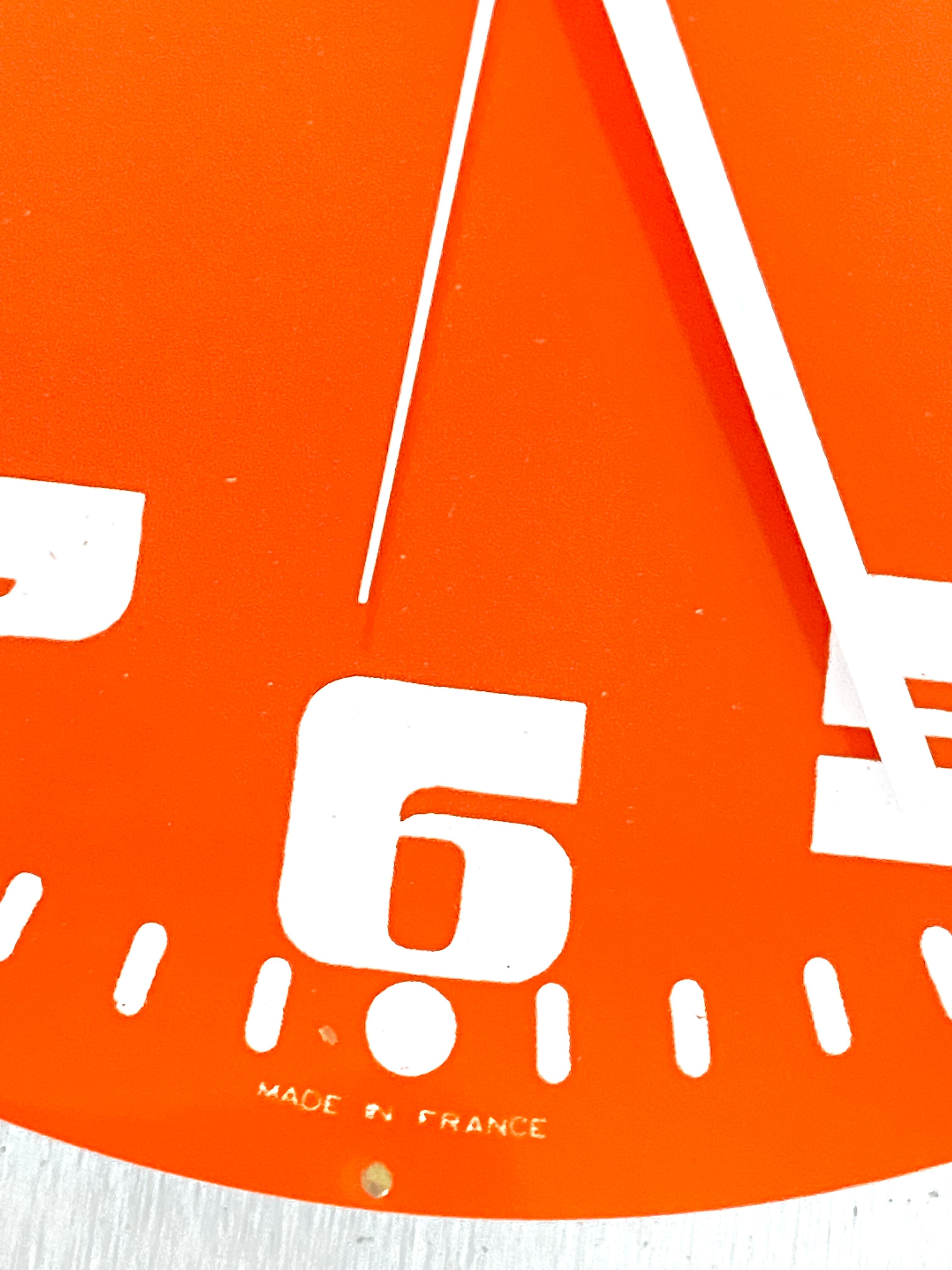 Vintage orange wall clock