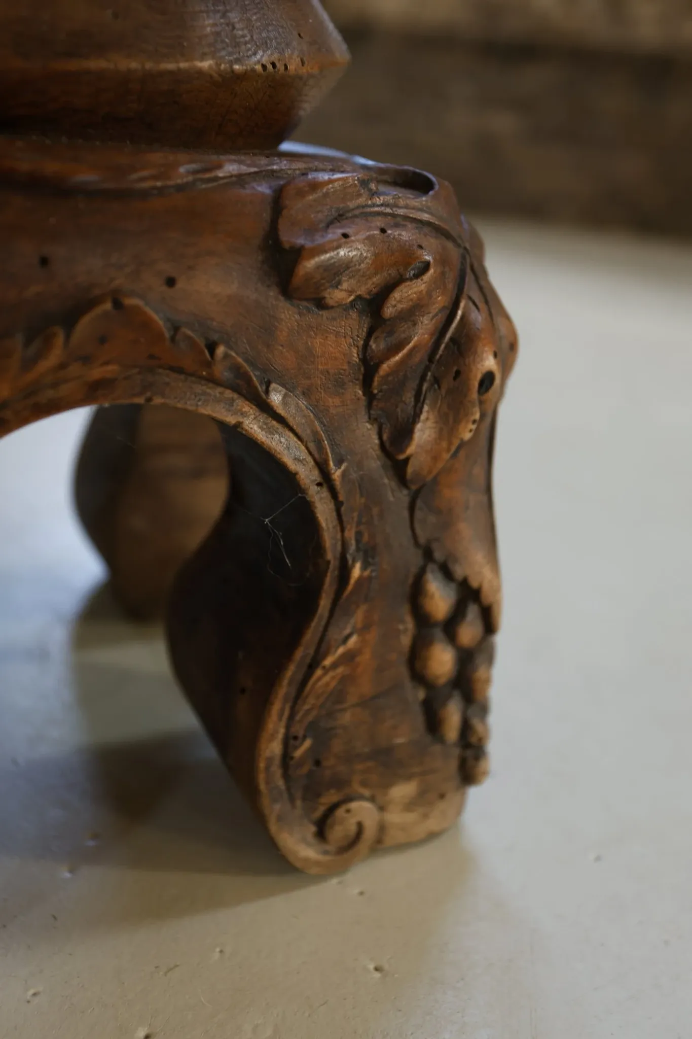 Antique French wooden plant stand with carved grape motifs